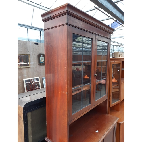 2891 - A VICTORIAN MAHOGANY TWO DOOR GLAZED AND LEADED CABINET WITH CUPBOARDS TO BASE, 40