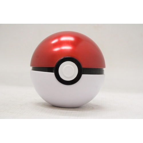 1100 - A POKEBALL CONTAINING A QUANTITY OF POKEMON CARDS