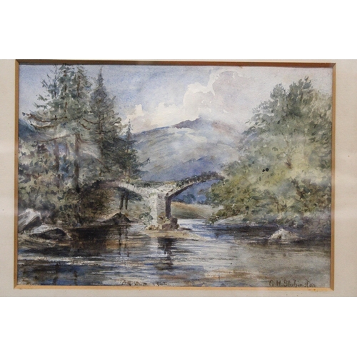 1154 - A FRAMED WATERCOLOUR OF A RIVER AND BRIDGE SCENE, SIGNED G H STUBINGTON