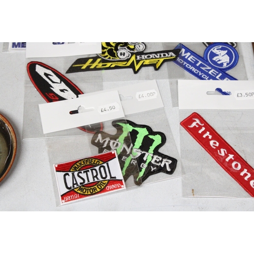 1159 - TWENTY MOTOR CYCLE THEMED SEW ON BADGES TO INCLUDE TRIUMPH, HONDA, GULF, ETC - ALL NEW IN PACKAGING