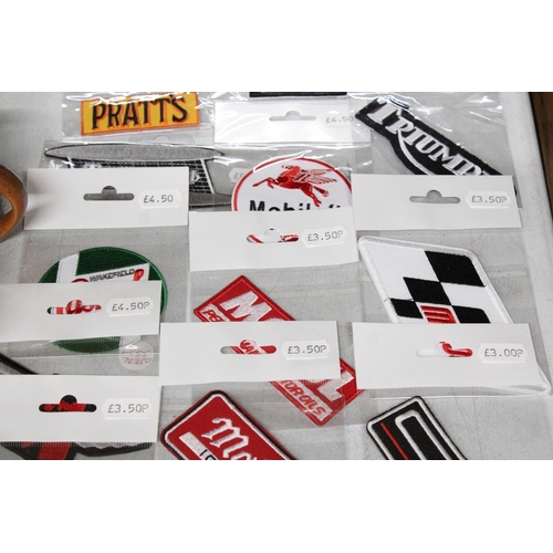 1159 - TWENTY MOTOR CYCLE THEMED SEW ON BADGES TO INCLUDE TRIUMPH, HONDA, GULF, ETC - ALL NEW IN PACKAGING