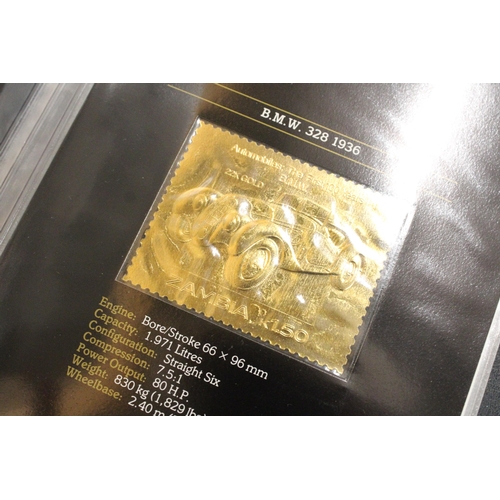 1184 - A ZAMBIA LIMITED EDITION CLASSIC CARS EMBOSSED 22 CARAT GOLD STAMPS IN AN ALBUM WITH CERTIFICATE OF ... 