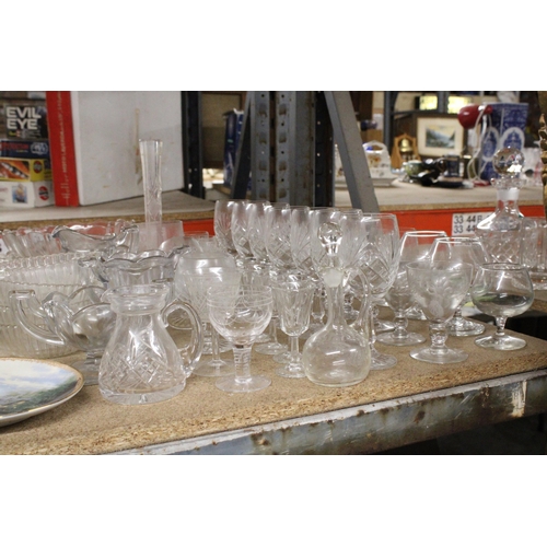 1196 - A LARGE QUANTITY OF GLASSWARE TO INCLUDE BOWLS, WINE GLASSES, SHERRY, BRANDY, ETC