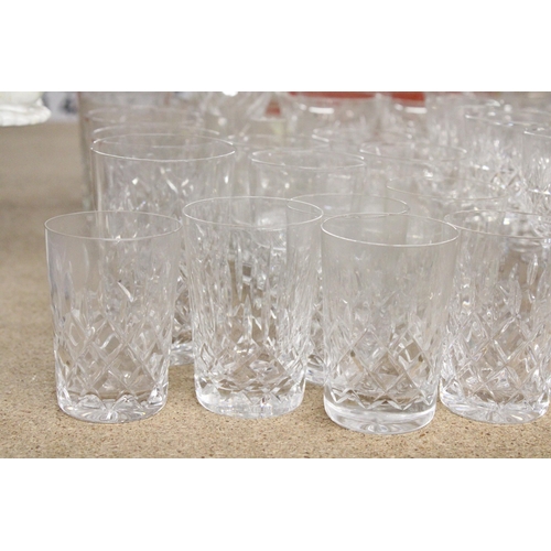 1199 - A QUANTITY OF DRINKING GLASSES TO INCLUDE A GLASS CARAFE