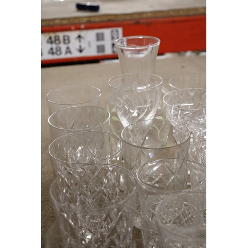 1199 - A QUANTITY OF DRINKING GLASSES TO INCLUDE A GLASS CARAFE