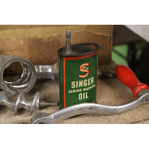 1286 - A METAL MEAT GRINDER AND SEWING MACHINE OIL