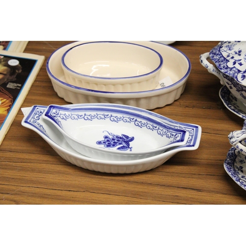 1300 - A QUANTITY OF BLUE AND WHITE SERVING PLATES, BOWLS, ETC TO INCLUDE 'SAVOY'