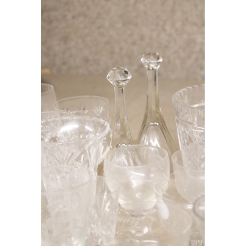 1310 - A LARGE ASSORTMENT OF GLASSWARE TO INCLUDE VASES, GOBLETS, TUMBLERS ETC