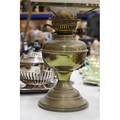 279 - A VINTAGE BRASS OIL LAMP WITH AN OPAQUE SHADE AND CHIMNEY