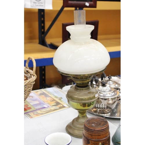 279 - A VINTAGE BRASS OIL LAMP WITH AN OPAQUE SHADE AND CHIMNEY