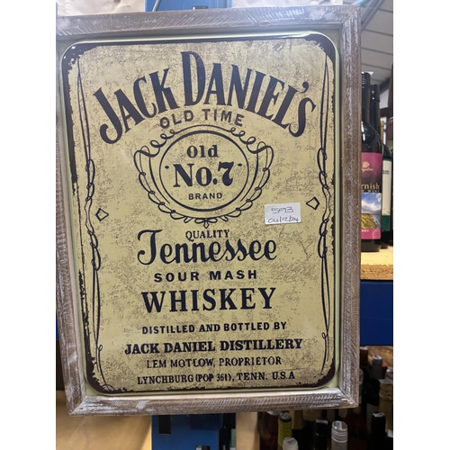 593 - A FRAMED TIN PLATE JACK DANIELS SIGN