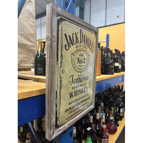 593 - A FRAMED TIN PLATE JACK DANIELS SIGN