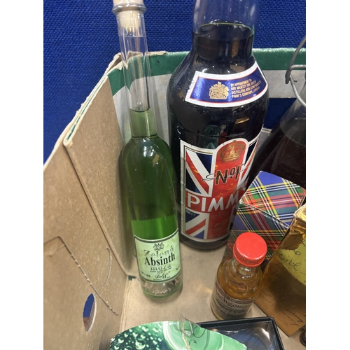 594 - VARIOUS ITEMS TO INCLUDE A BOTTLE OF PIMMS, ABSINTH, HARVEYS SHERRY, MINIATURES, HIP FLASKS, BOTTLE ... 