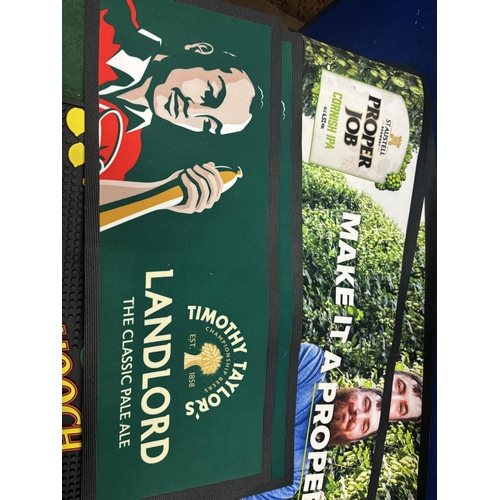 595 - A HOOCH ICE/BOTTLE BUCKET AND A SELECTION OF BEER MATS TO INCLUDE THREE TIMOTHY TAYLORS, THREE PROPE... 