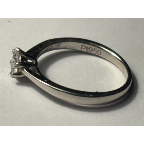 601 - A MARKED PLATINUM RING WITH A 0.29CT SOLITAIRE DIAMOND SIZE H/I