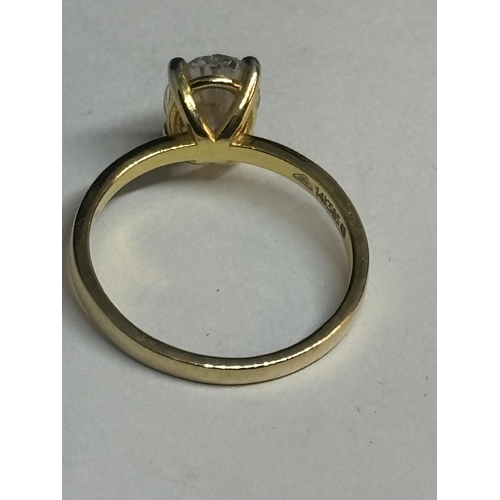 608 - A MARKED 14 CARAT YELLOW GOLD RING WITH AN APPROXIMATELY 2 CARAT OVAL SOLITAIRE DIAMOND SIZE O IN A ... 