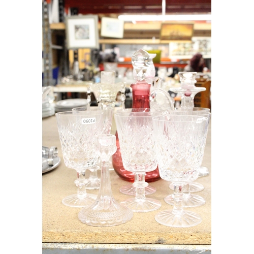 1170 - A QUANTITY OF GLASSWARE TO INCLUDE CANDLESTICKS, WINE GLASSES, A CRANBERRY GLASS DECANTER, ETC