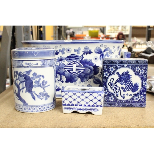 1172 - FOUR BLUE AND WHITE ORIENTAL CERAMIC ITEMS TO INCLUDE A LARGE PLANTER, STORAGE JAR, POT POURRI POT, ... 