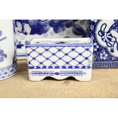 1172 - FOUR BLUE AND WHITE ORIENTAL CERAMIC ITEMS TO INCLUDE A LARGE PLANTER, STORAGE JAR, POT POURRI POT, ... 