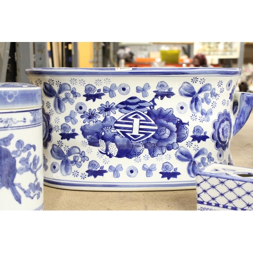 1172 - FOUR BLUE AND WHITE ORIENTAL CERAMIC ITEMS TO INCLUDE A LARGE PLANTER, STORAGE JAR, POT POURRI POT, ... 