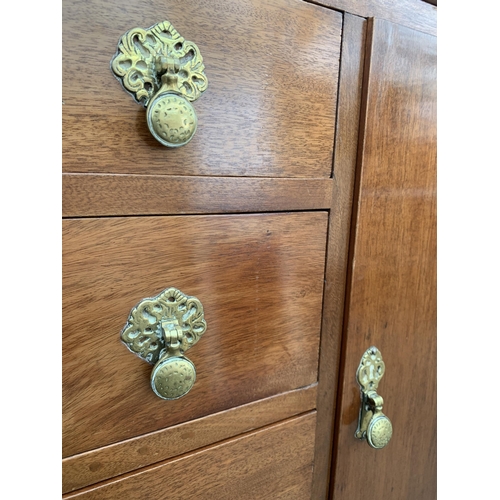 2994 - AN EARLY 20TH CENTURY MAHOGANY SIDEBOARD ON BALL AND CLAW FEET - 60