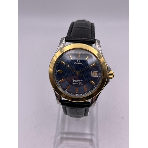 527 - AN 18K GOLD AND STEEL OMEGA SEAMASTER AUTOMATIC CHRONOMETER MEN'S WRIST WATCH WITH 18K GOLD BEZEL 37... 