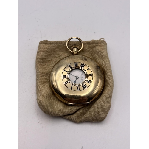 530 - AN ANTIQUE HALF HUNTER YELLOW METAL POCKET WATCH 47MM