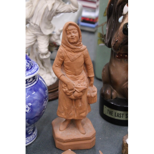 909 - A TERRACOTTA FIGURE OF A LADY, THREE PIGS AN A YOUNG GIRL