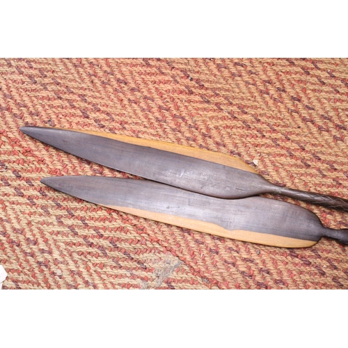 962 - TWO VINTAGE HAND CARVED AFRICAN SPEARS