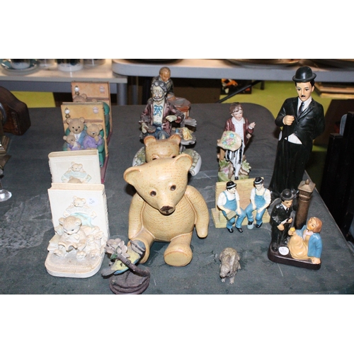 1077 - A QUANTITY OF CERAMICS FIGURES TO INCLUDE TWO PAIRS OF TEDDY THEMED BOOK-ENDS, CHARLIE CHAPLIN, LAUR... 