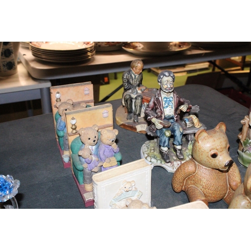 1077 - A QUANTITY OF CERAMICS FIGURES TO INCLUDE TWO PAIRS OF TEDDY THEMED BOOK-ENDS, CHARLIE CHAPLIN, LAUR... 