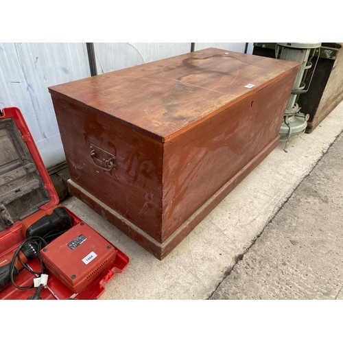 1665 - A VINTAGE PINE CHEST ON WHEELED BASE