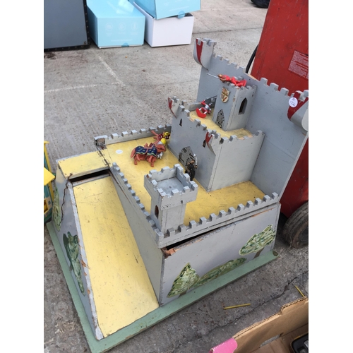 1811 - A WOODEN CASTLE FORT AND A FURTHER PLASTIC TOY HOUSE