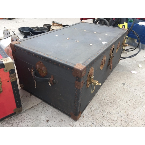 1821 - A GREY COMPRERSSED FIBRE TRAVEL TRUNK