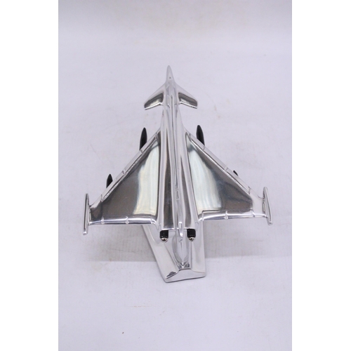 258 - A CHROME TYPHOON FIGHTER JET ON A BASE