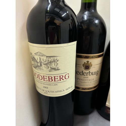 348 - SIX BOTTLES OF RED WINE TO INCLUDE KMV ROODEBERG WINE OF WESTERN CAPE 2003, OAK VILLAGE VINTAGE RESE... 