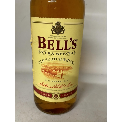 409 - A LITRE BOTTLE OF BELL'S EXTRA SPECIAL OLD SCOTCH WHISKY AGED 8 YEARS