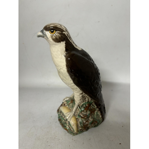 440 - A ROYAL DOULTON OSPREY MODELLED BY D LYTTLETON 1977 FILLED AND SEALED WITH WHYTE AND MACKAY SCOTCH W... 