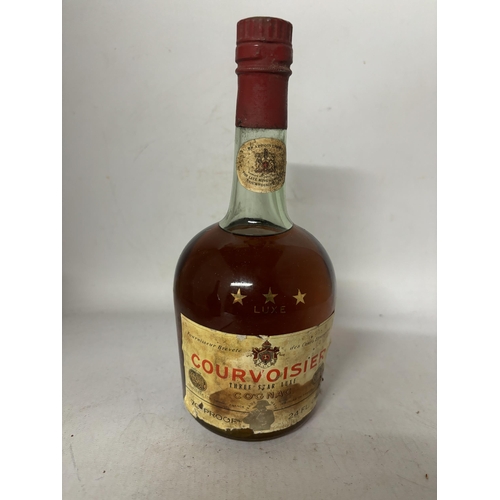 443 - A BOTTLE OF COURVOISIER THREE STAR LUXE COGNAC 70% PROOF