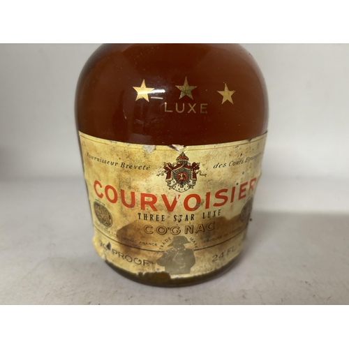 443 - A BOTTLE OF COURVOISIER THREE STAR LUXE COGNAC 70% PROOF