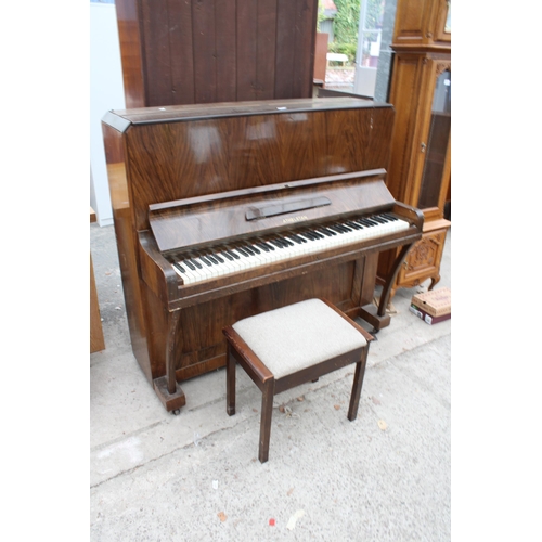 2910 - AN ATHELSTAN WALNUT UPRIGHT PIANO AND STOOL