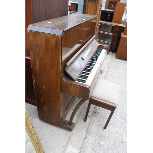 2910 - AN ATHELSTAN WALNUT UPRIGHT PIANO AND STOOL