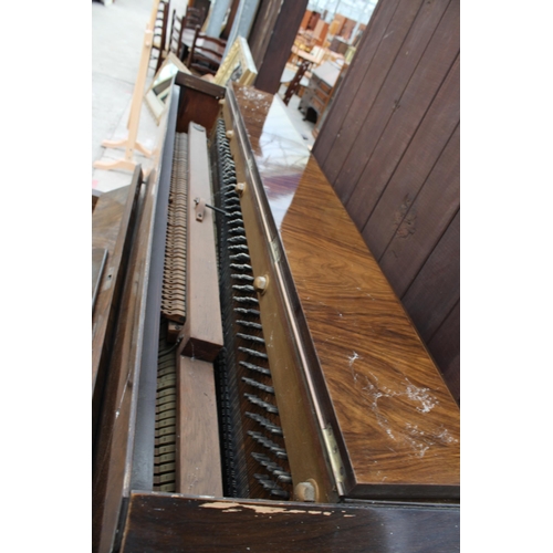 2910 - AN ATHELSTAN WALNUT UPRIGHT PIANO AND STOOL