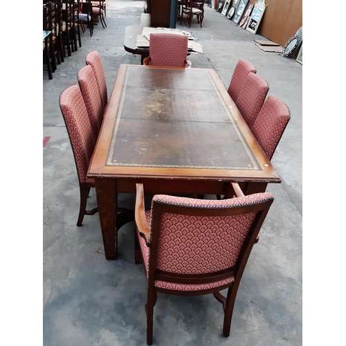 2912 - AN EDWARDIAN OAK BOARDROOM TABLE ON TAPERING LEGS WITH SHAPED STRETCHERS, HAVING INSET LEATHER TOP A... 