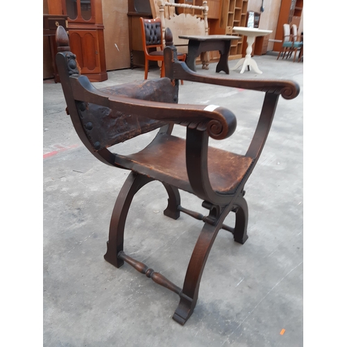 2913 - AN 18TH CENTURY STYLE OAK X FRAMED CHAIR WITH LEATHER BACK AND SEAT