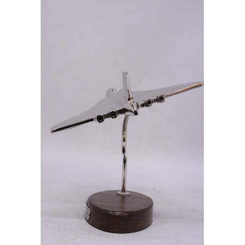 155 - A CHROME VULCAN BOMBER ON A WOODEN BASE