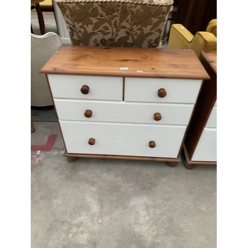 2935 - A PINE CHEST OF TWO SHORT AND TWO LONG DRAWERS