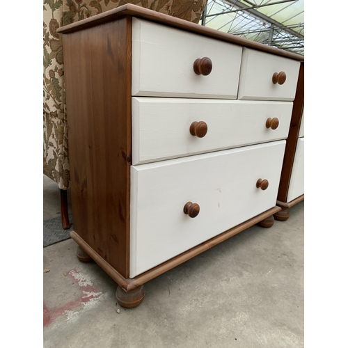 2935 - A PINE CHEST OF TWO SHORT AND TWO LONG DRAWERS