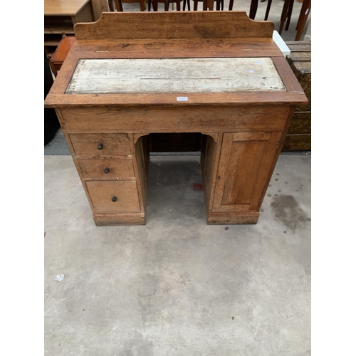 2937 - VICTORIAN PINE CLERKS DESK ENCLOSING THREE DRAWERS AND A CUPBOARD