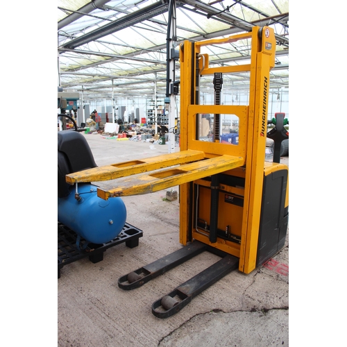 134 - JUNGHEINRICH BATTERY POWERED PALLET TRUCK WITH CHARGER - IN WORKING ORDER  + VAT